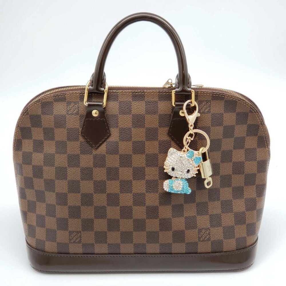 Authentic Louis Vuitton Lock & Key with unbranded Hello Kitty Bagcharm, Keycharm - Picture 8 of 8
